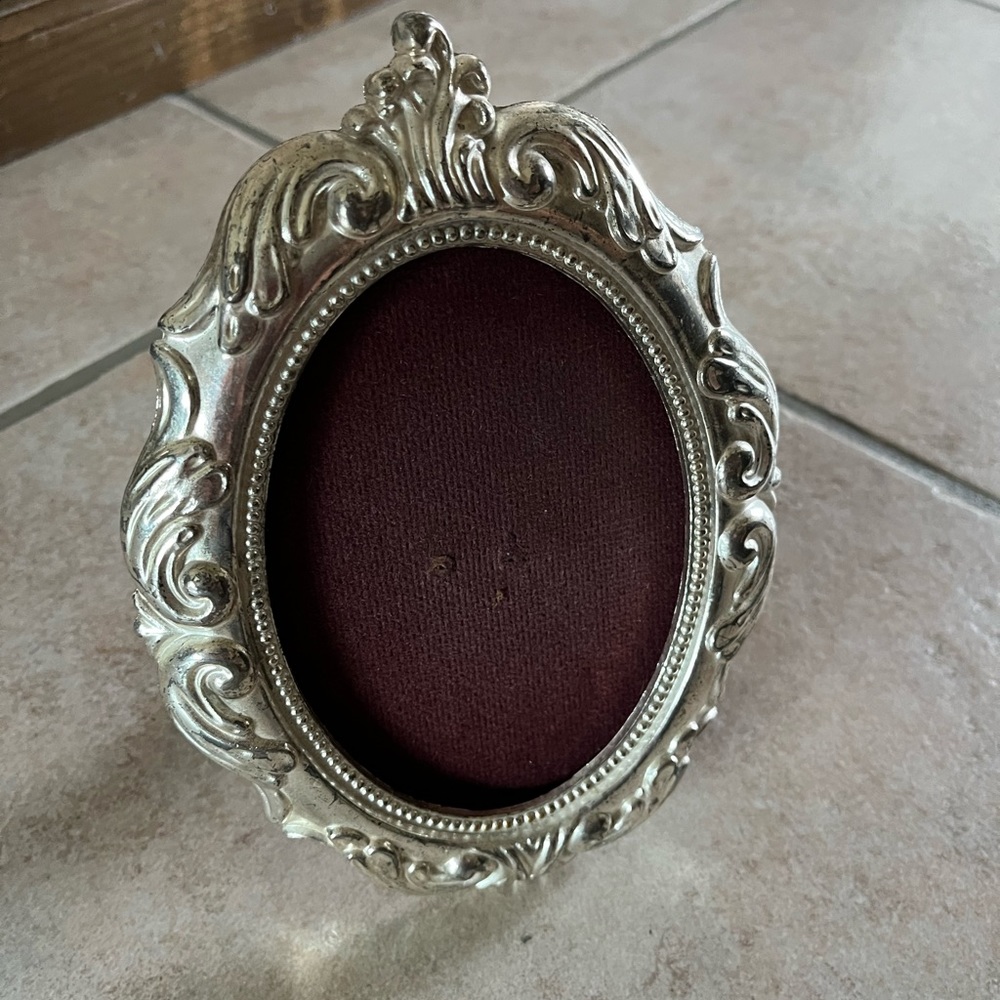 Silver plated oval frame scrolls teleflora brand no glass